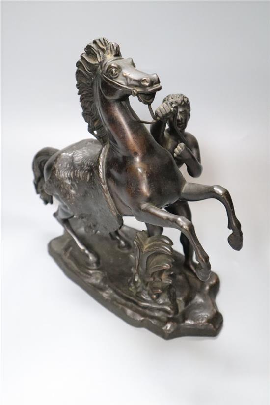 After Coustou. A bronze Marli horse group, 25cm